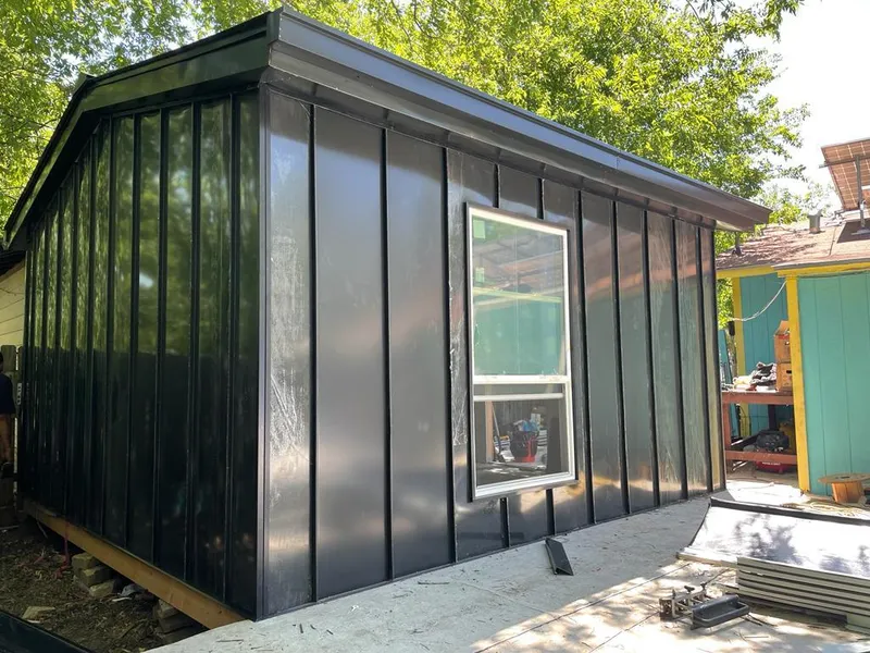 Black standing seam metal wall panels for Roof Inspection in Canandaigua